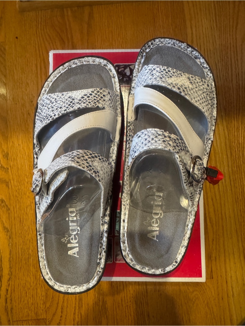 Alegria Snake-Print Slide Sandals in Gray and White